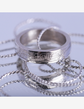 Silver colored Saudi coin circle