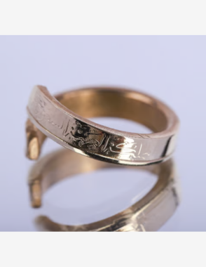 Golden colored coin ring opened