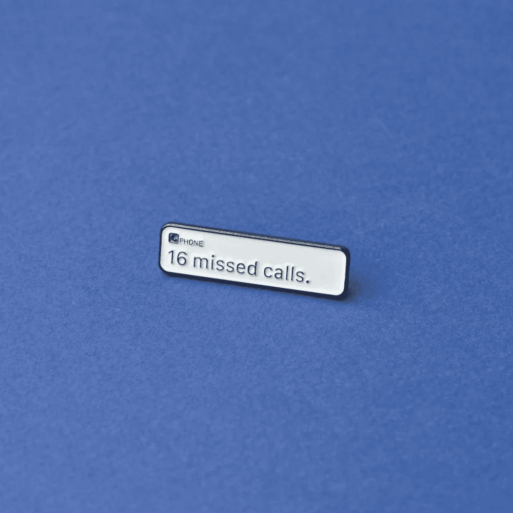 Green Goat 16 missed calls enamel pin