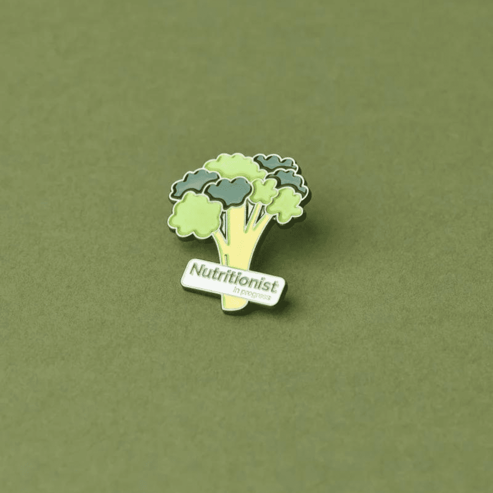 Green Goat nutritionist enamel pin